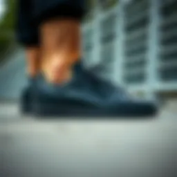 Adidas Stan Smith black sneakers showcasing their sleek design