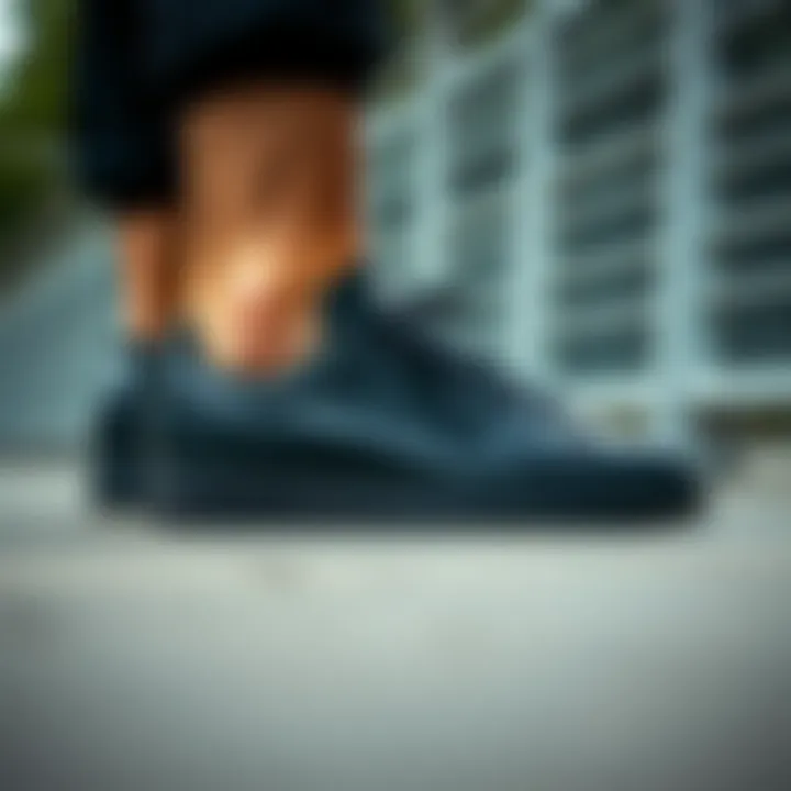 Sleek Design of Adidas Stan Smith Adidas Stan Smith black sneakers showcasing their sleek design