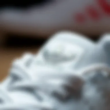 Logo and Detailing of Adidas Stan Smith Close-up view of the Adidas Stan Smith logo and detailing