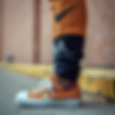 Brown Converse paired with sporty athletic wear