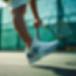 Dynamic tennis action showcasing performance footwear