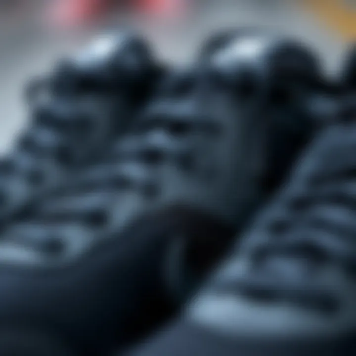 Close-up of the intricate design and texture of Nike black athletic shoes