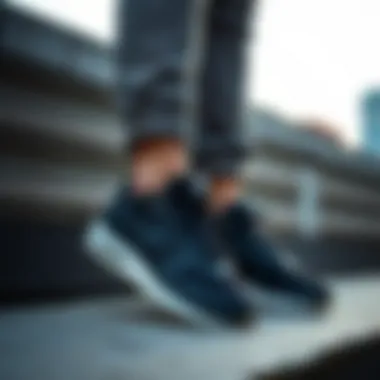 Lifestyle shot of Nike black sneakers paired with casual attire