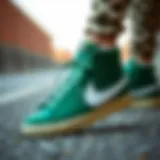 Detailed view of Nike Blazer Mid 77 green shoes showcasing design elements