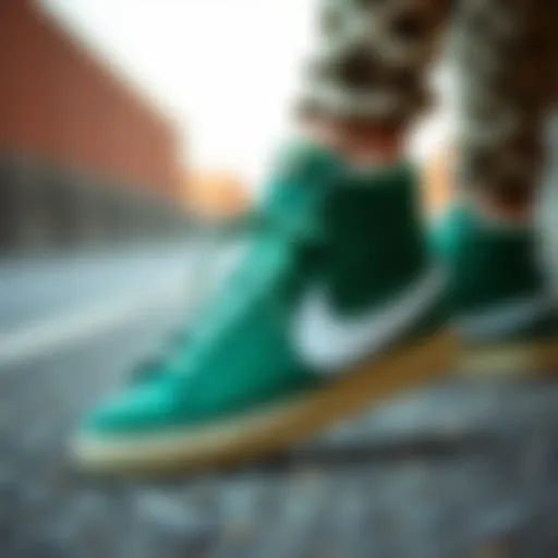 Detailed view of Nike Blazer Mid 77 green shoes showcasing design elements