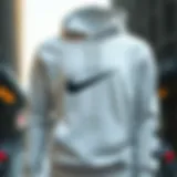 Front view of the Nike Sportswear Club Hoodie showcasing its elegant design and fabric texture