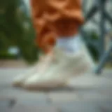 The Perfect Blend of Elegance and Sportiness Elegant beige Puma footwear paired with stylish athletic attire