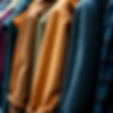 Various fabric textures of seasonal coats on display.