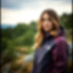 Stylish woman wearing The North Face jacket in an outdoor setting