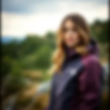 Stylish woman wearing The North Face jacket in an outdoor setting