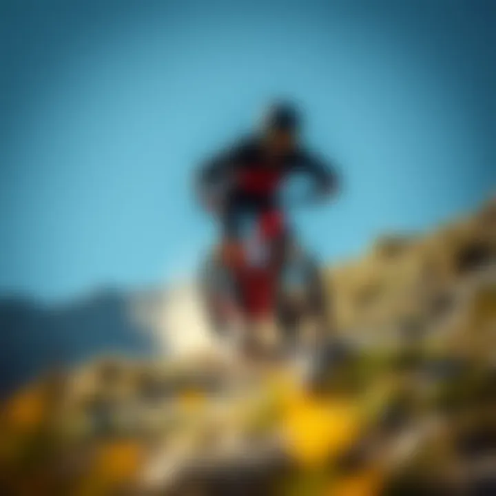 A breathtaking view of a mountain biker navigating a steep trail.